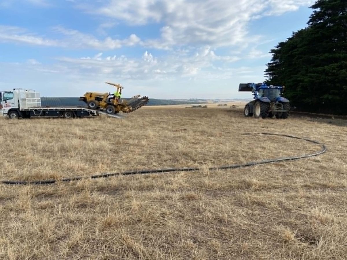 Trencher on site for a farm water run